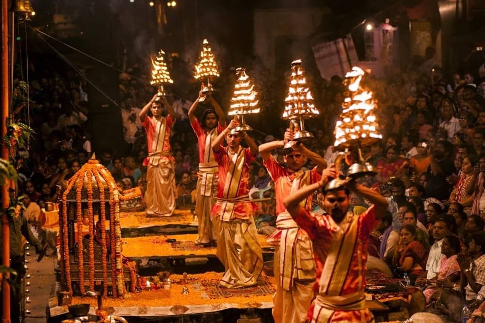 Varanasi, Ganga Aarti, Dashashwamedh Ghat, Maha Kumbh, Kashi Vishwanath Temple, devotees, crowd management, district administration, priests, volunteers, religious sites, Prayagraj, pilgrimage, spiritual tourism, safety measures